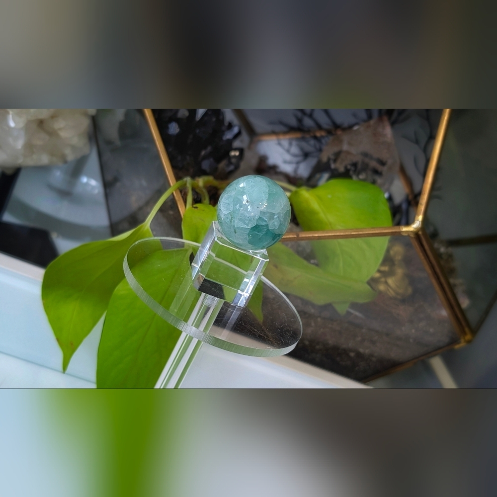 Rainbow Fluorite Crystal Sphere on Glass Stand
